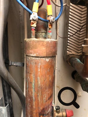 Close up of Electramate flow boiler showing electrical terminals